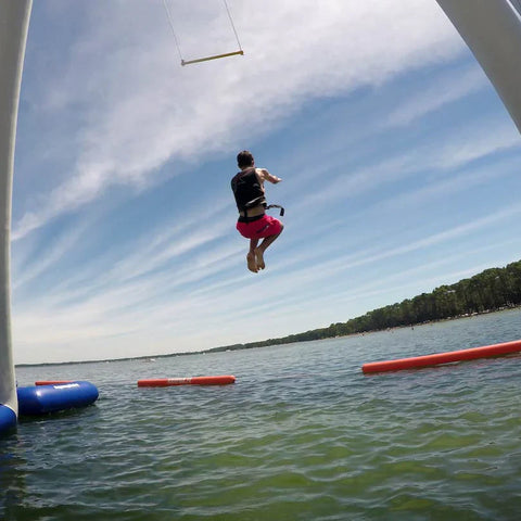 Image of Aquaglide Skyrocket Inflatable Water Park with Trapeze-Style Swing